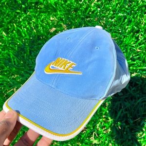 Baby blue  suede based Nike cap with yellow